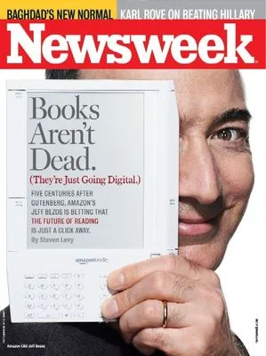  Cover of Newsweek Magazine with photo of Amazon's Jeff Bezos holding a Kindle 1 e-reader. 