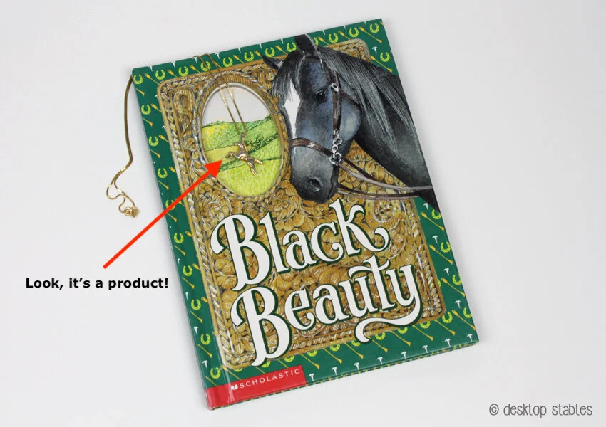  Photo of Black Beauty book with a horse necklace included. 