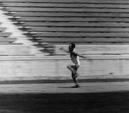  Gif of track and field athlete trying and failing to clear a hurdle on the track. 