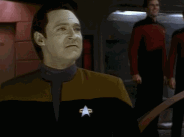  Gif of the character Data from Star Trek: The Next Generation yelling “Yes” followed by a very enthusiastic fist pump. 
