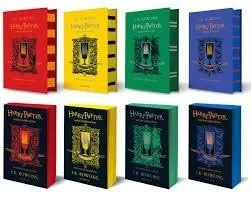  Photo of eight Harry Potter books. Four Hardcover and four Paperback with covers reflecting the four houses of Hogwarts (Slytherin, Gryffindor, Hufflepuff, and Ravenclaw) in Harry Potter. 