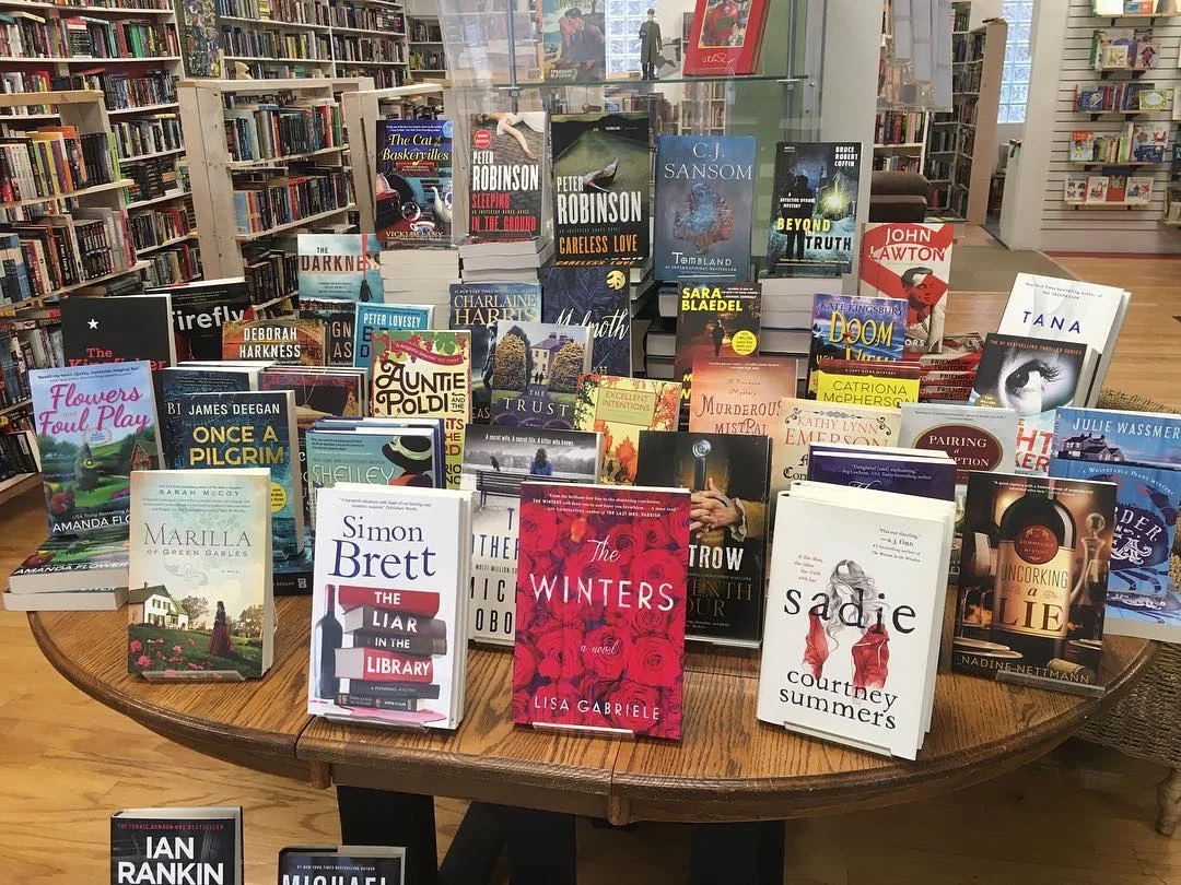  Photo of a book display table in Whodunit? 